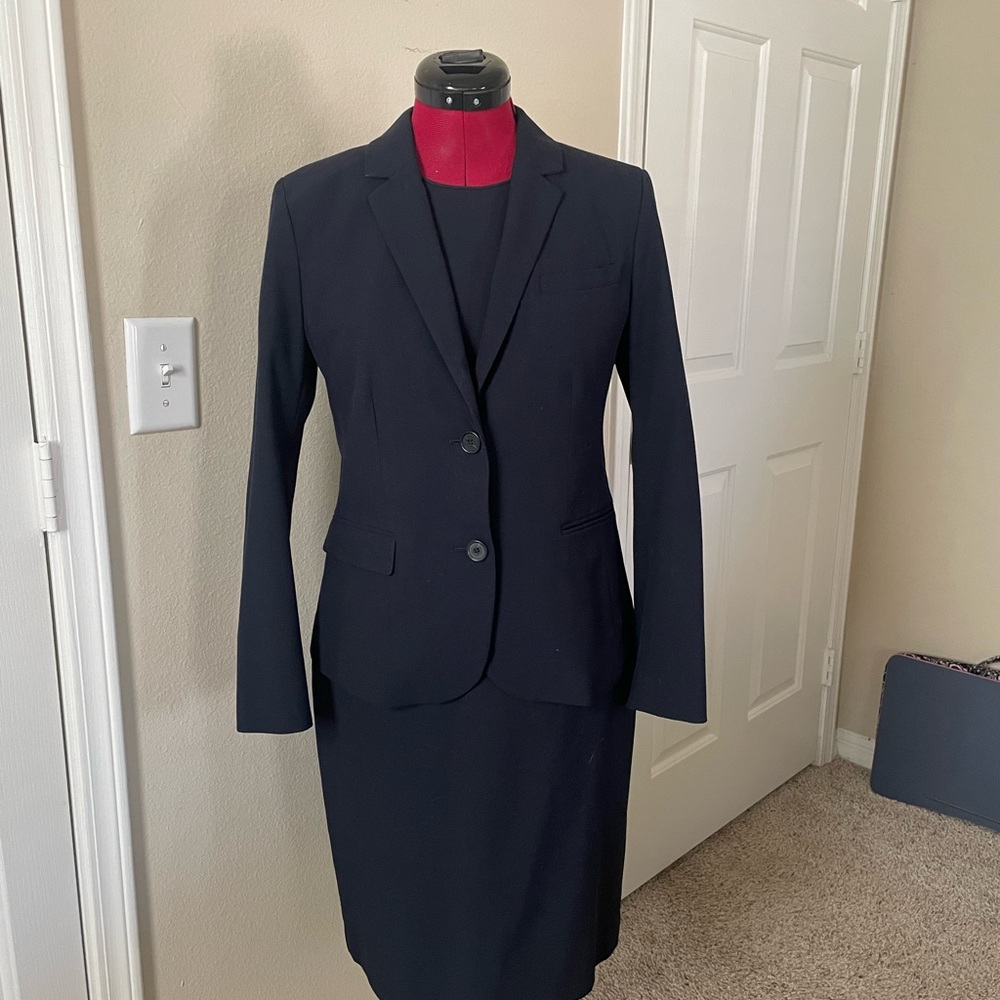 Ann Taylor navy suit set. Includes blazer, sheath dress, and pencil skirt.